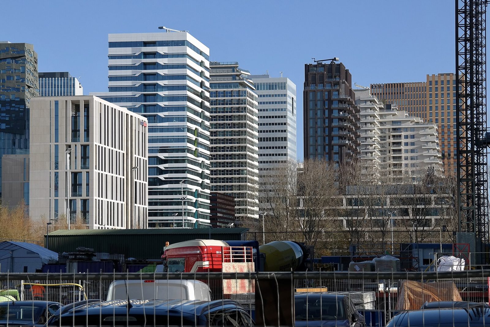 Modern corporate glass towers in the Amsterdam Zuidas business district